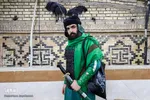 حسین روزبه 28 سال دارد و نقش حضرت ابوالفضل (ع) را در تعزیه اجرا می‌کند.