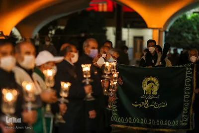 مراسم شام غریبان و لاله گردانی خادمین حرم شاهچراغ (ع)