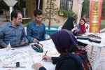 بداهه‌نويسی خوشنويسان شيرازی در جشن ميلادامام رضا(ع)