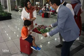 بدرقه‌ای با شاخه گل غدیر