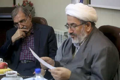 حجت‌الاسلام محمدعلی مهدوی‌راد و علی موسوی گرمارودی، شاعر