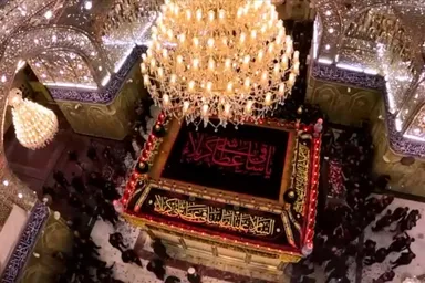 فیلم | طواف پیکر رهبر شهید بر گرد ضریح حضرت عباس(ع)