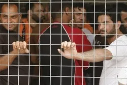 د بحرین په زندان کې لږ تر لږه ۱۰۰ بندیان په کورونا ویروس ککړ شوې دي