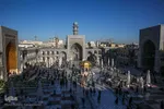 تعویض پرچم گنبد حرم امام رضا(ع)
