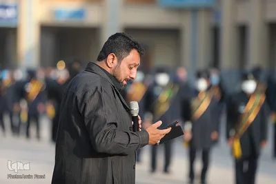 مراسم تعویض پرچم گنبد حرم حضرت شاهچراغ (ع)