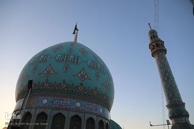 آیین تعویض پرچم گنبد آستان مسجد مقدس جمکران در آستانه ایام فاطمیه