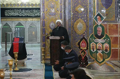 تعویض پرچم گنبد حرم رضوی در آغاز ماه محرم