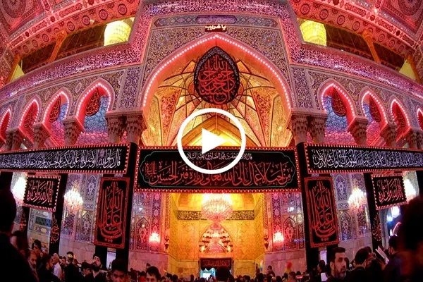 بالفيديو... رفع صور شهداء قادة النصر من داخل حرم الامام الحسين(ع)