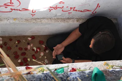 مراسم‌ خاکسپاری شهید گمنام دربوستان الهیه بیرجند