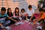 آماده‌سازی لباس همایش جهانی شیرخوارگان حسینی