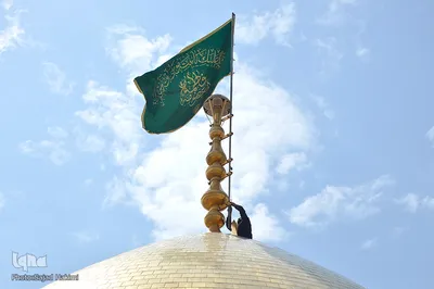 رونمایی و اهتزاز پرچم جدید حرم حضرت معصومه (س)