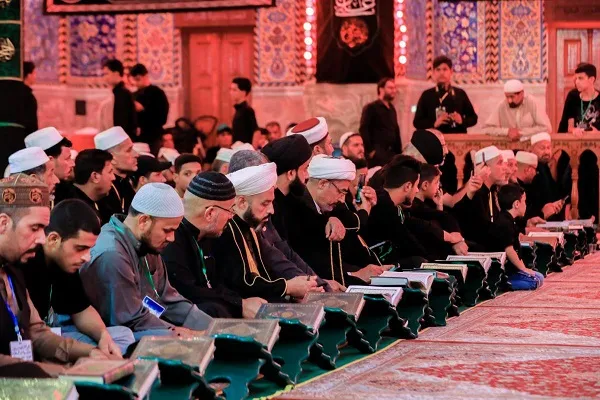 بالصور .. إتّحاد التجمّعات القرآنيّة في العراق یستهلّ مسيرته العزائيّة بأمسية قرآنيّة
 