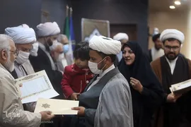 تجلیل از روحانیون برگزیده طرح 313 کمیته امداد امام خمینی(ره)