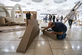 آماده سازی غرفه ایکنا در بیست و سومین نمایشگاه مطبوعات