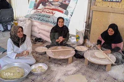 پخت نان سنتی صلواتی در حرم شاهچراغ(ع)‎‎