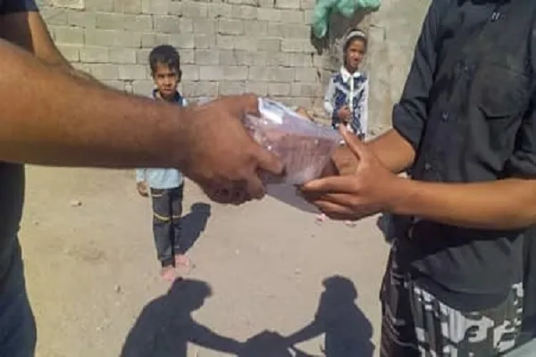 هزار بسته گوشت قربانی ویژه محرم بین محرومین کرمانشاهی توزیع شد