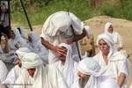 مراسم غسل تعمید منداییان در کنار رودخانه کارون