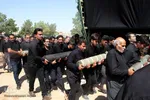 آیین نخل گردانی ظهر عاشورا در شاهدیه یزد