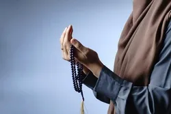 مشی گن میں مسلمان وکیل کی چادر پر بحث چھڑ گیی