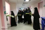 عیادت از بیماران توسط خادمین حرم امام رضا (ع)