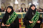 آیین تعویض پرچم گنبد حرم امام رضا(ع)
