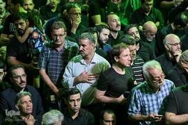 آیین سنتی نخل گردانی و عزاداری ظهر عاشورا در تکیه بزرگ تجریش
