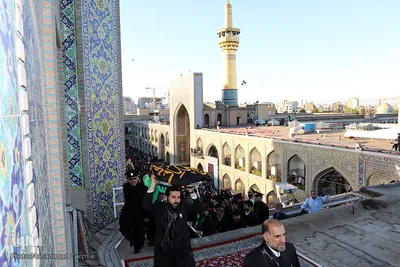 آئین تعویض پرچم گنبد مطهر رضوی در آستانه ماه محرم