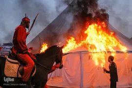 مراسم خیمه سوزان عصر عاشورا در میدان امام حسین (ع) تهران
