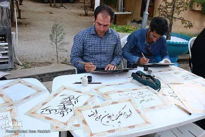 بداهه‌نويسی خوشنويسان شيرازی در جشن ميلادامام رضا(ع)