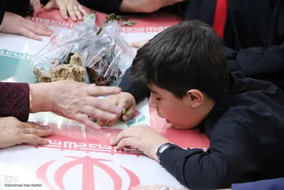 وداع با ۱۲ شهید جنگ رمضان استان فارس در حرم شاهچراغ(ع)