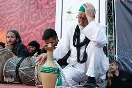 مراسم خیمه سوزان عصر عاشورا در میدان امام حسین (ع) تهران
