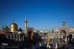 تعویض پرچم گنبد حرم امام رضا(ع)
