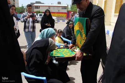 مراسم استقبال از خدام و پرچم رضوی در ملایر