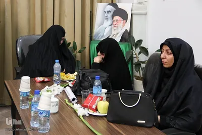 مراسم استقبال ازخانواده‌های شهدای شاهچراغ در مشهد مقدس