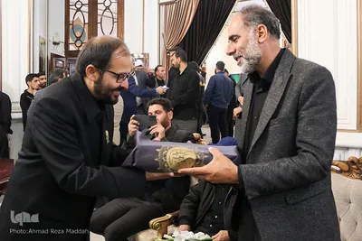 مراسم استقبال ازخانواده‌های شهدای شاهچراغ در مشهد مقدس