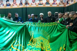 حضور خادمان بارگاه امام علی بن موسی الرضا در معراج الشهدا سپاه