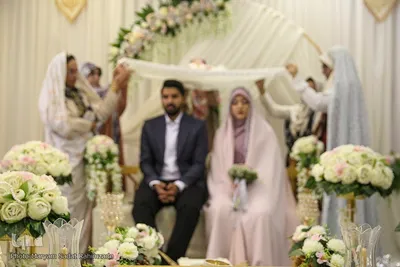 مراسم عقد ازدواج جمعی از جوانان در آستان شاهچراغ به‌ مناسبت عید غدیر