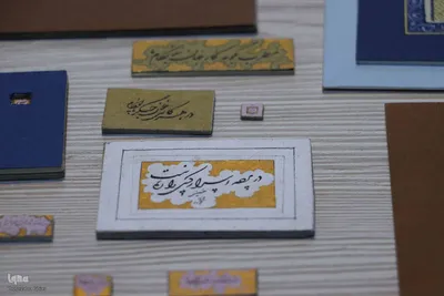 خوشنویسی که هنرش با ذره‌بین دیده می‌شود‎