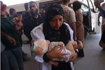 Quatro Mortos, Including Criança, enquanto Ataques Israelenses a Abrigos em Gaza Continuam