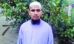 কুরআন শেখাচ্ছেন অন্ধ হাফেজ রুমান