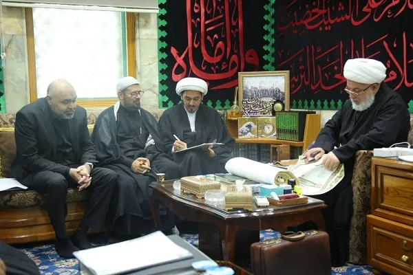 بالصور...خطّ السور الأخيرة لمصحف الأربعين في العراق