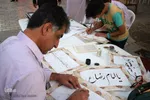 بداهه‌نويسی خوشنويسان شيرازی در جشن ميلادامام رضا(ع)