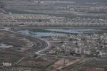 تصاویر هوایی از رودخانه کارون و منطقه سیل‌زده بامدژ
