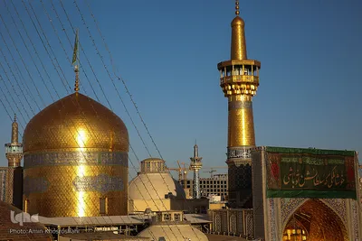آئین تعویض پرچم گنبد حرم امام رضا(ع)