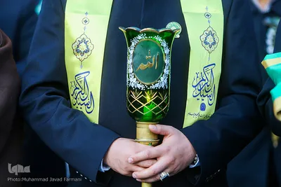 آیین تعویض پرچم سیدالکریم در شب ولادت آن حضرت