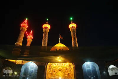 تعویض پرچم گنبد حرم رضوی در آغاز ماه محرم