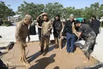 آیین گل مالی لرستانی‌ها مقیم قم در روز عاشورا