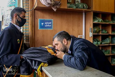 آیین تعویض پرچم گنبد آستان حضرت شاهچراغ (ع)‎‎