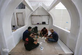 آماده سازی غرفه ایکنا در بیست و سومین نمایشگاه مطبوعات