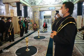 آیین تعویض پرچم و اقامه عزا در حرم حضرت معصومه(س)